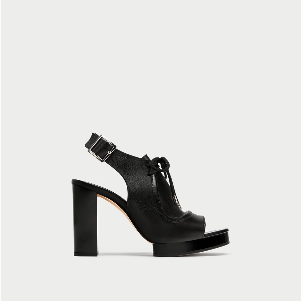 Buckled leather slingback sandals